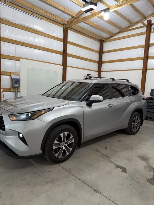 Silver Toyota Highlander with tinted windows
