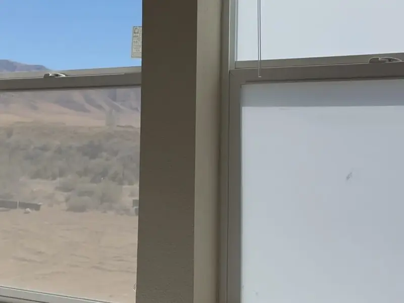 House windows with a clear view on the left and frosted glass on the right